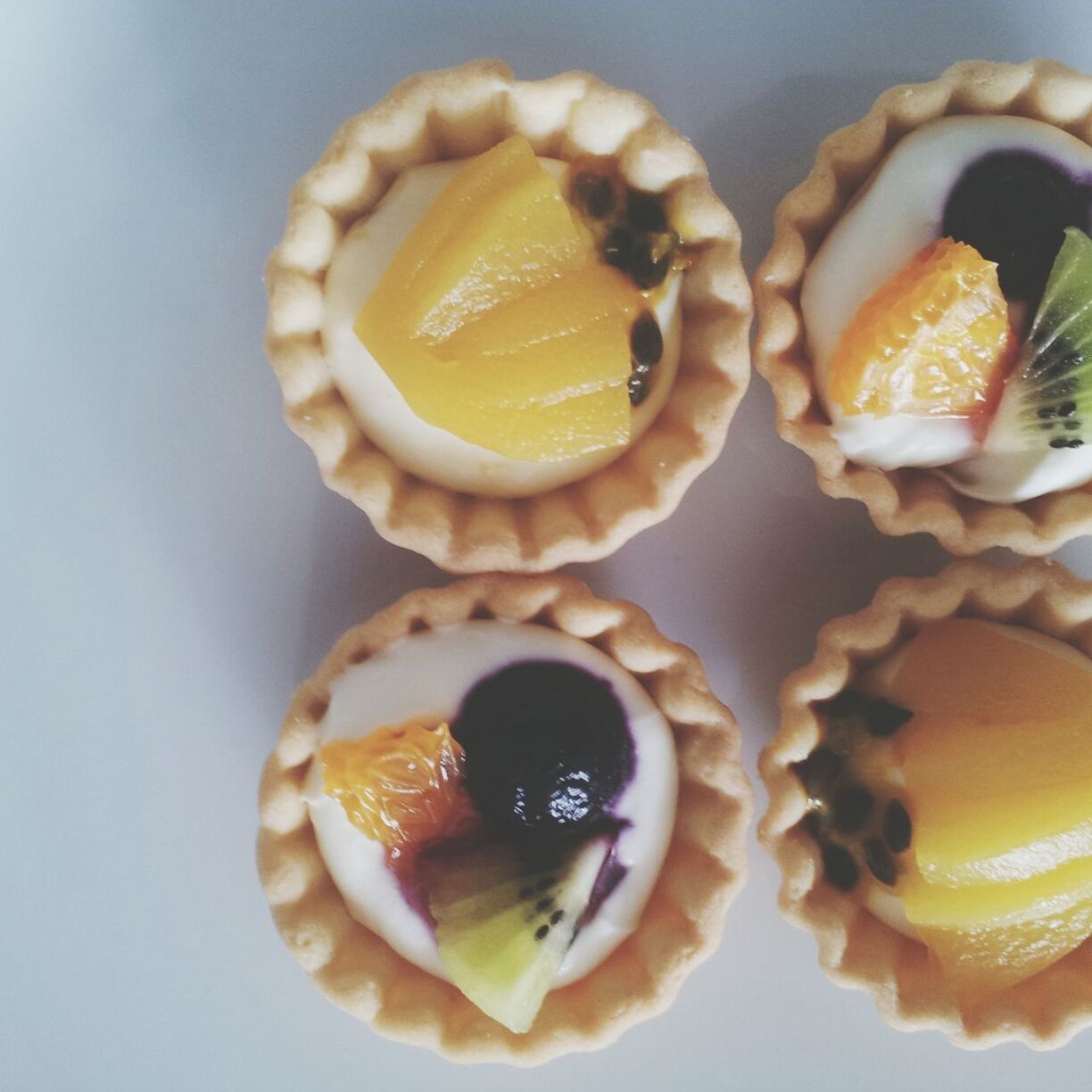 Close-up of pastries on white surface