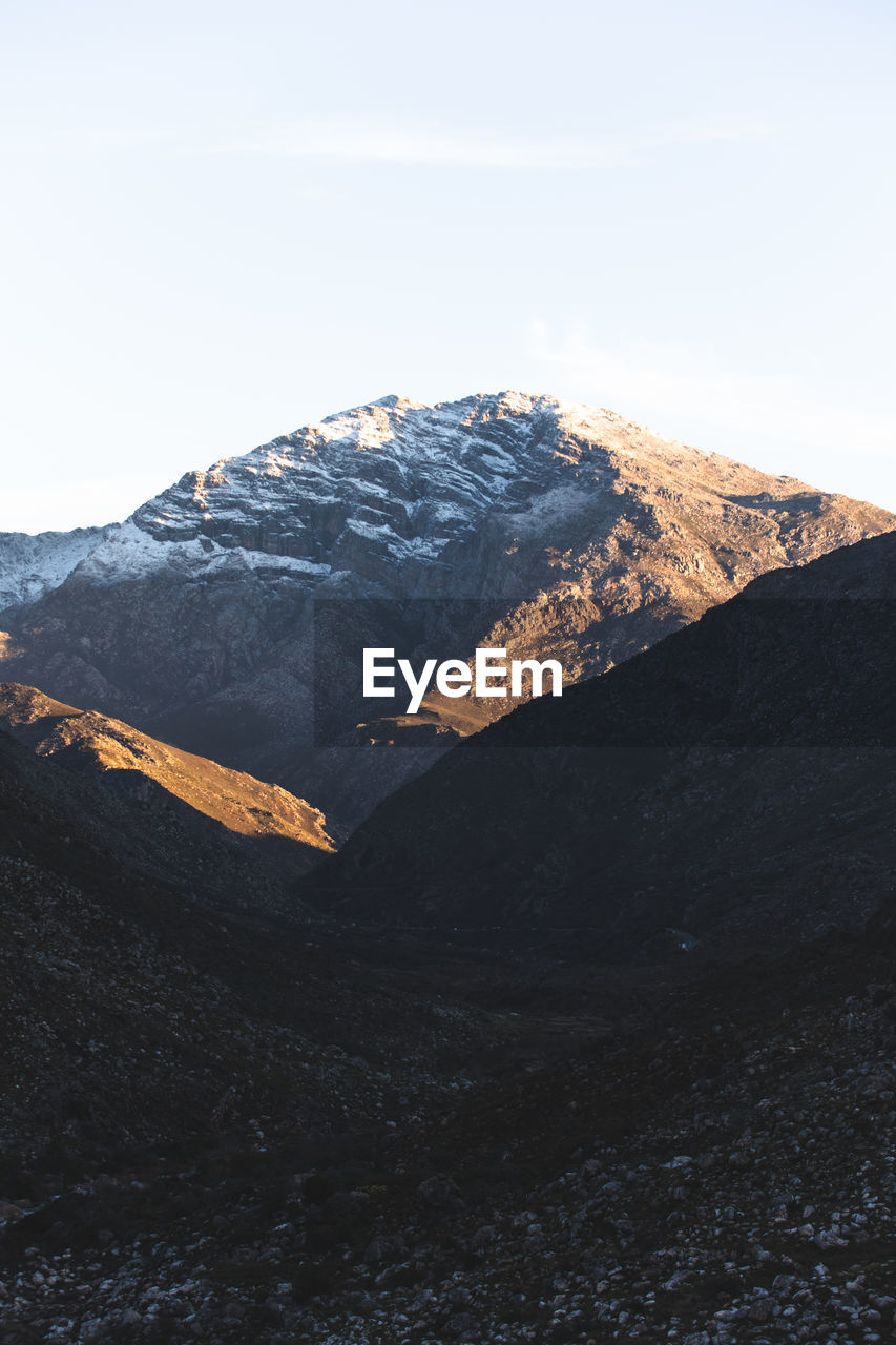 Scenic view of snowcapped mountain against sky