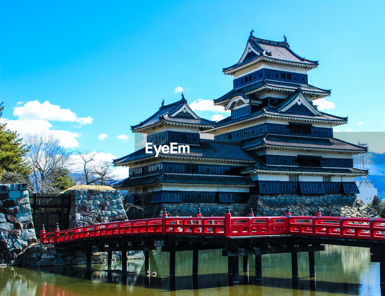 Low angle view of matsumoto castle against blue sky
