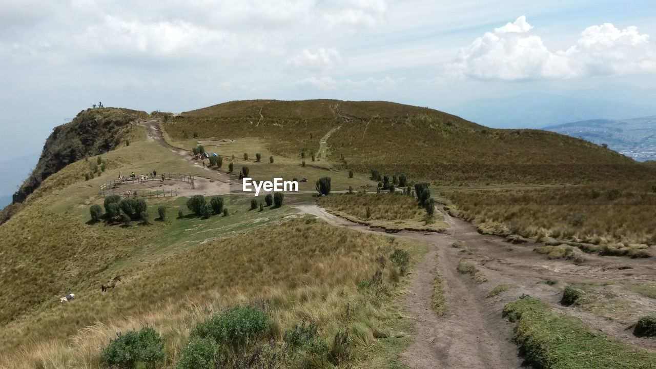 PANORAMIC VIEW OF ROAD AMIDST LANDSCAPE AGAINST SKY