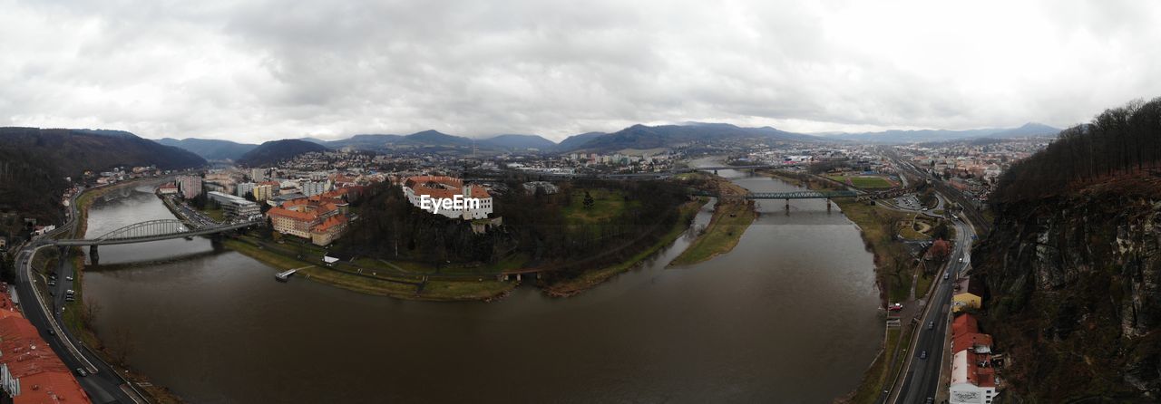 High angle view of river amidst buildings in city