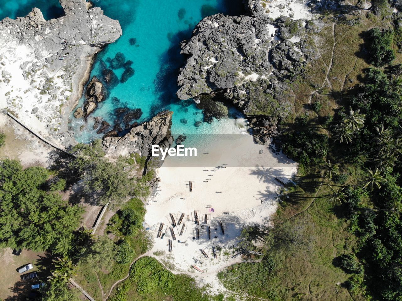 High angle view of rocks by sea