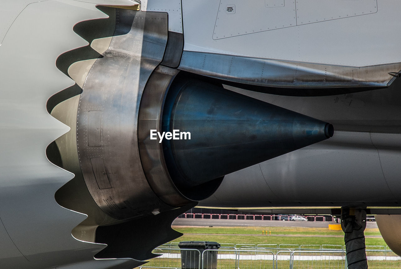 CLOSE-UP OF AIRPLANE AT AIRPORT