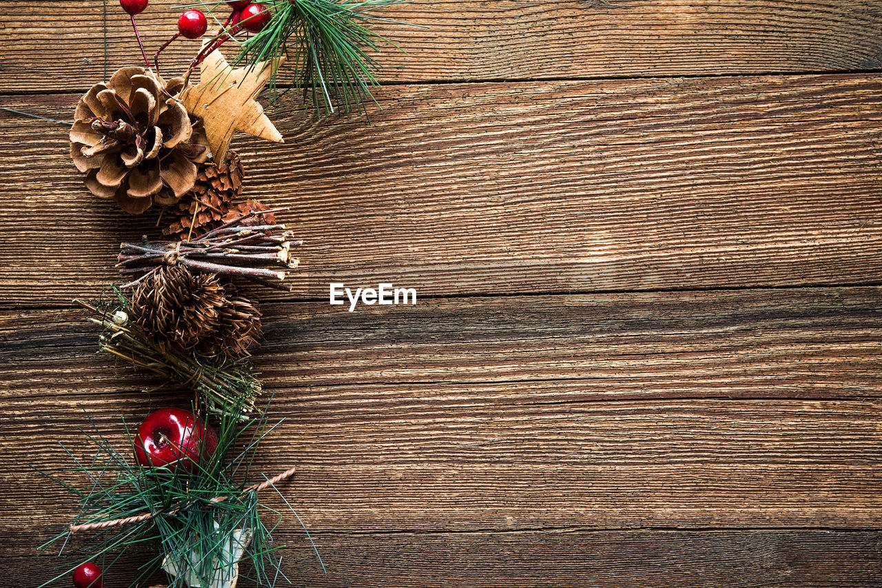 Close-up of christmas decoration on wooden table