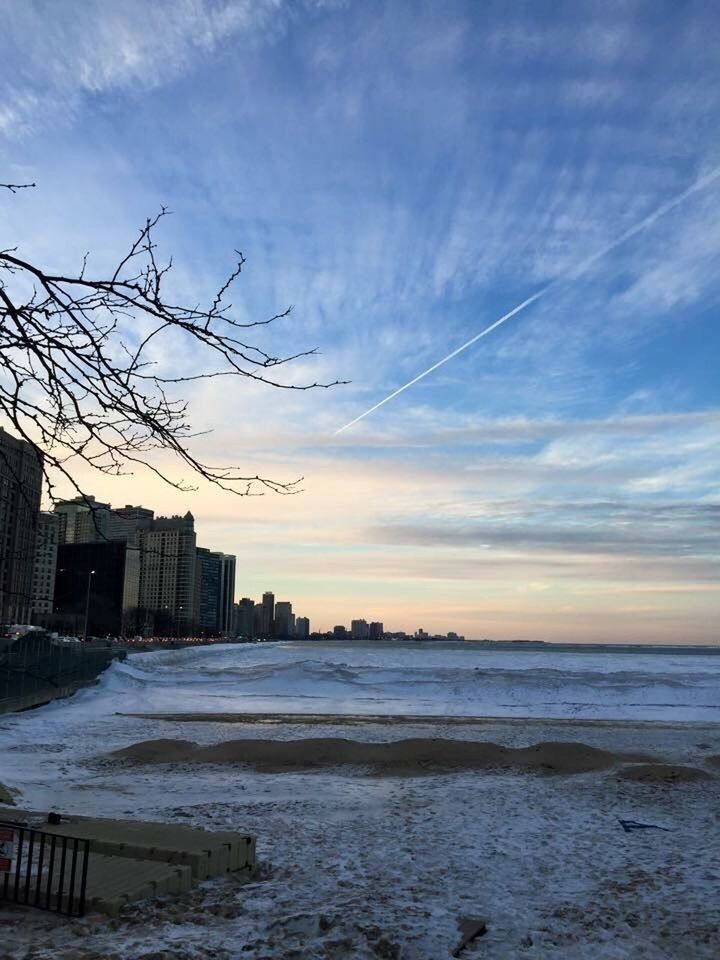 VIEW OF CITY AT SUNSET