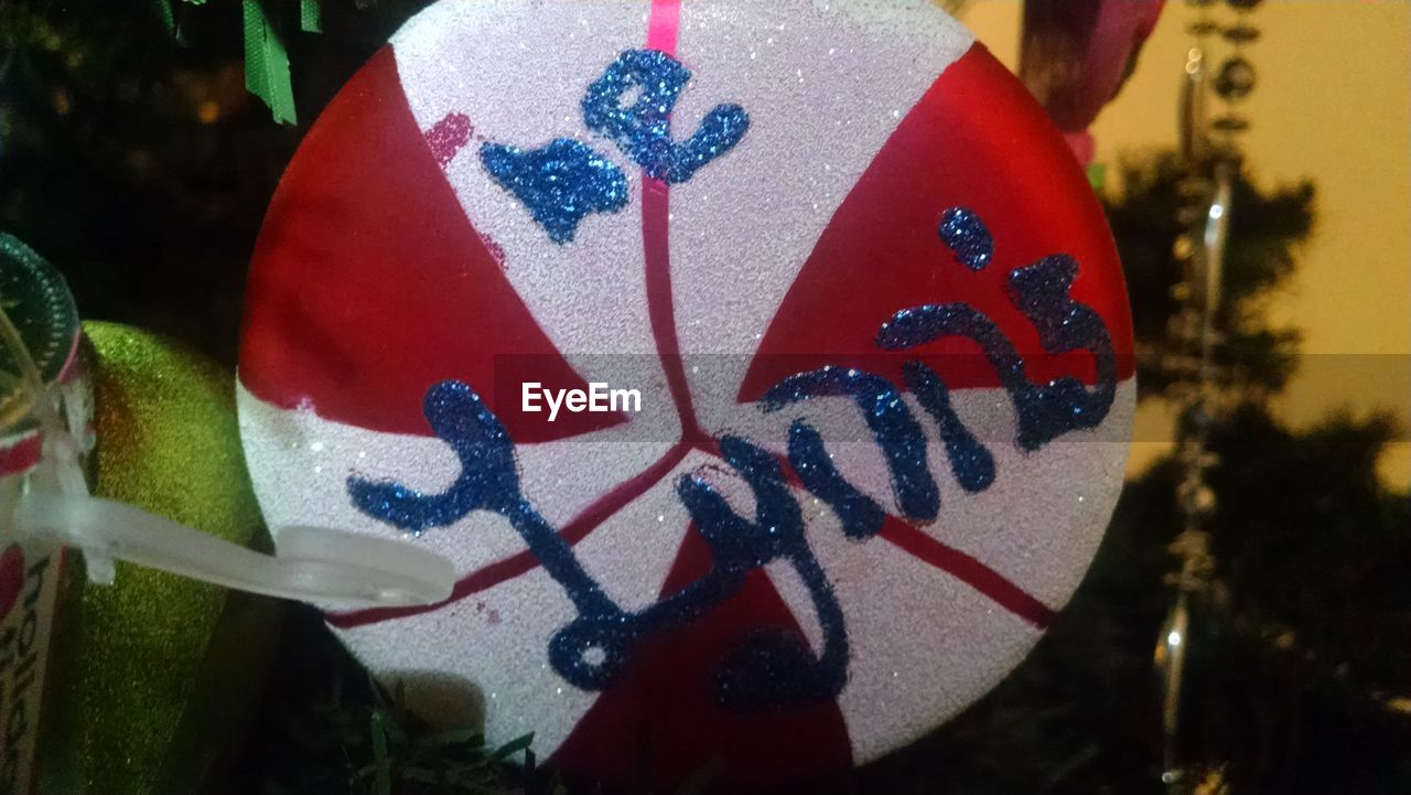 CLOSE-UP OF RED DECORATIONS