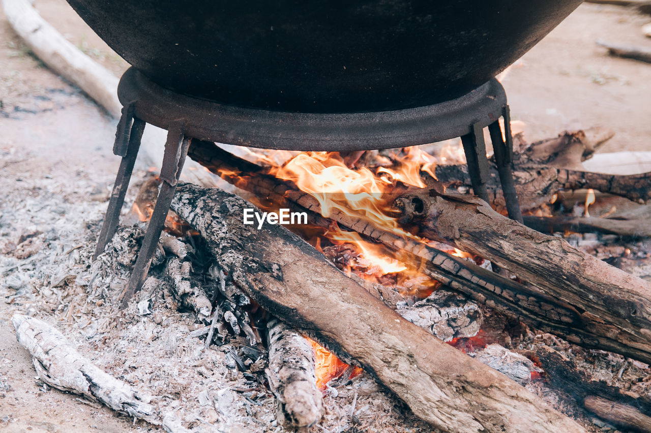 High angle view of firewood on barbecue grill