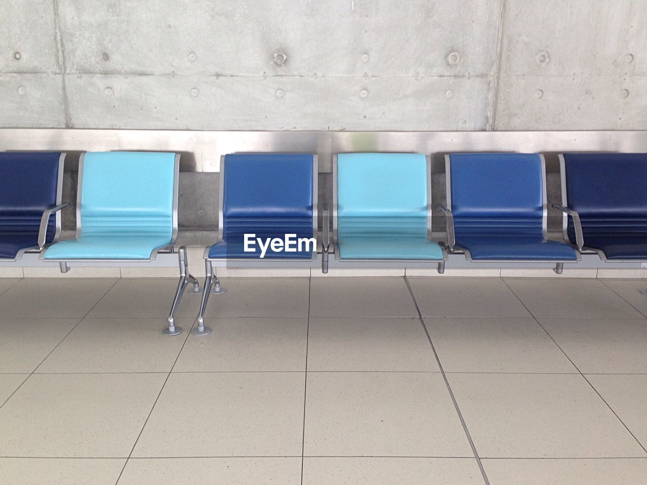 Empty chairs at airport