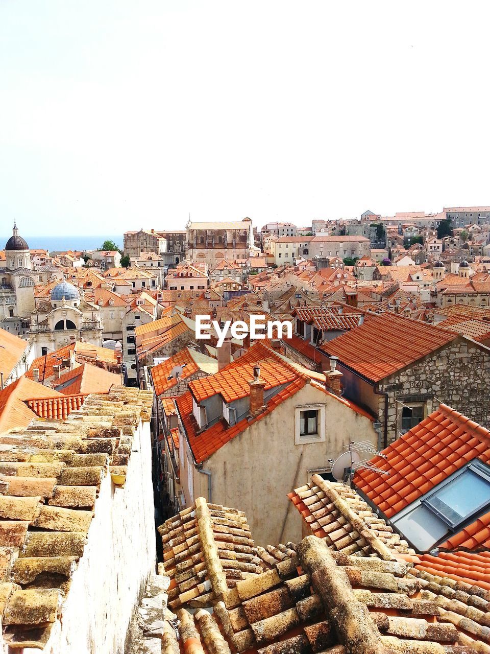 High angle view of buildings against clear sky