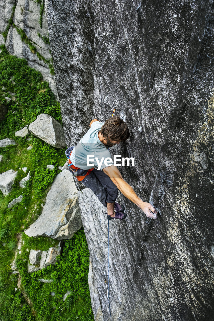 High angle view of man climbing on mountain