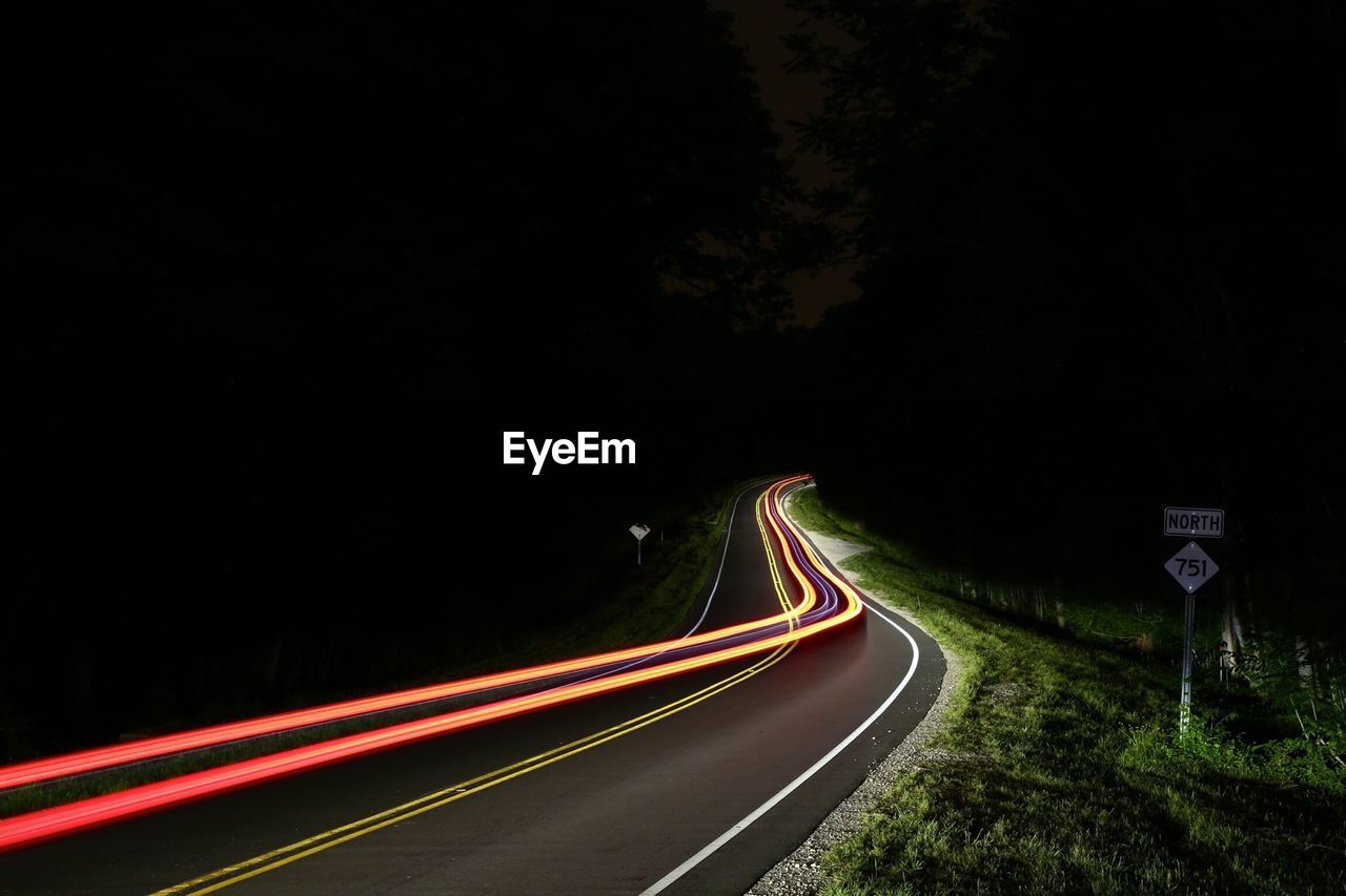 Light trails on country street at night