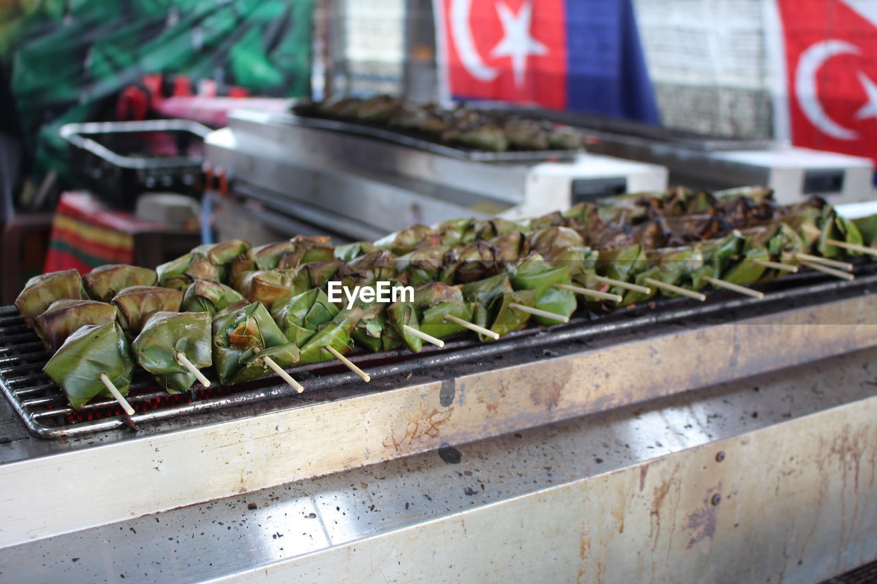 Close-up of malaysian food for sale at market stall