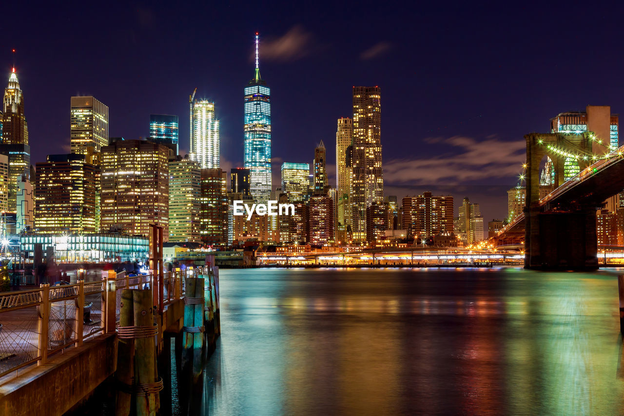 Illuminated buildings in city at night