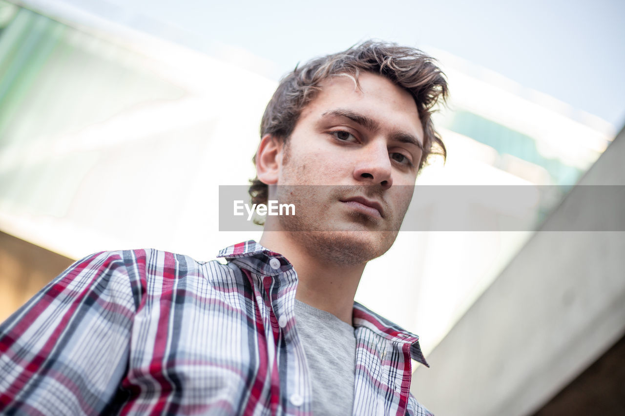 Portrait of young man looking serious