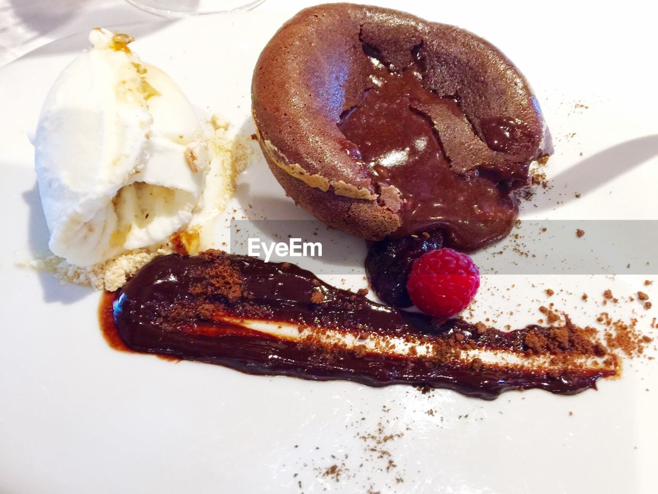 CLOSE-UP OF CAKE WITH ICE CREAM