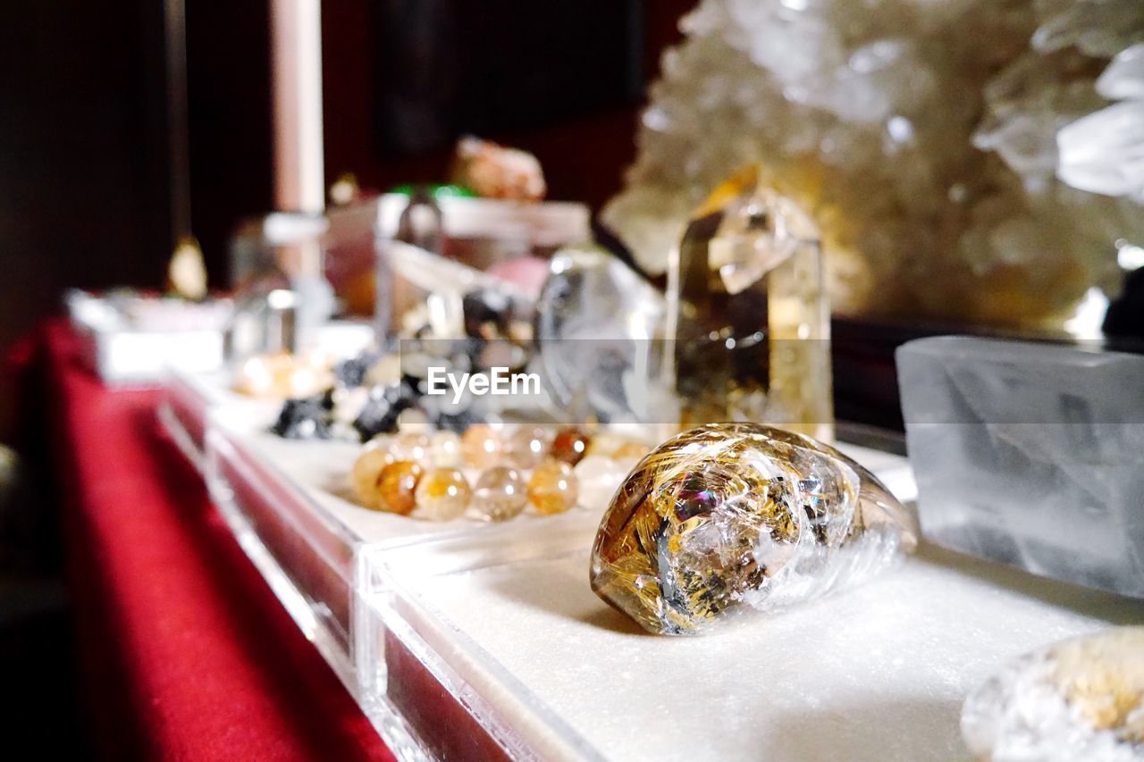 Close-up of various gems on table