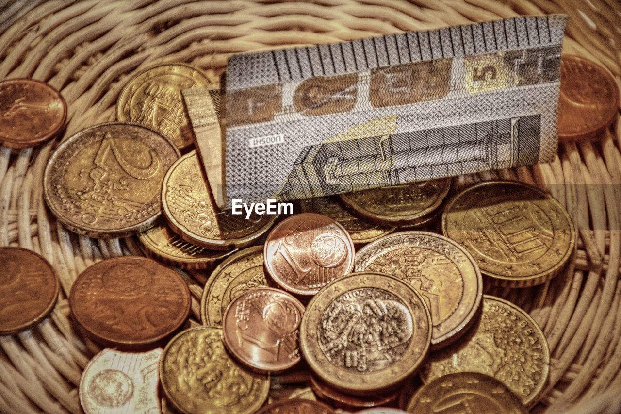 High angle view of currency in basket