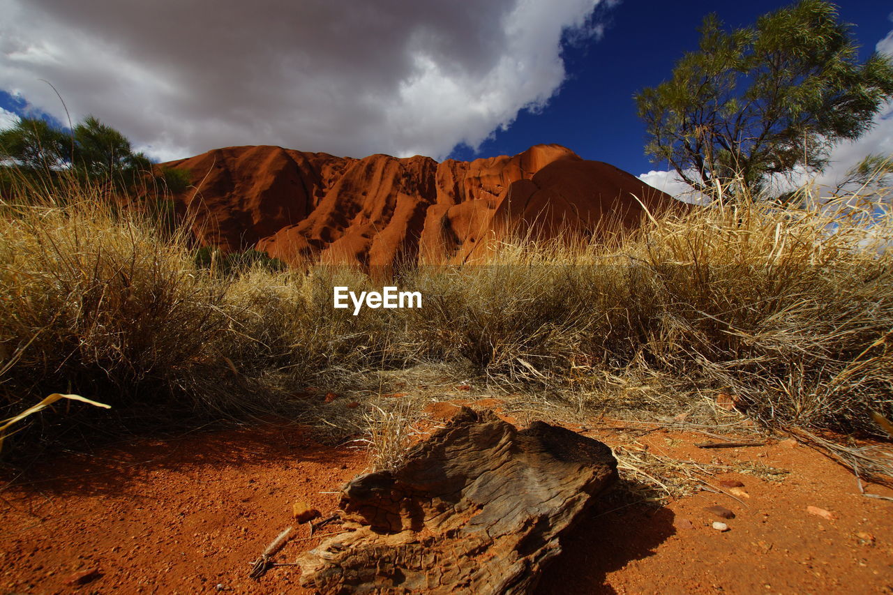 Rock formations on landscape against sky