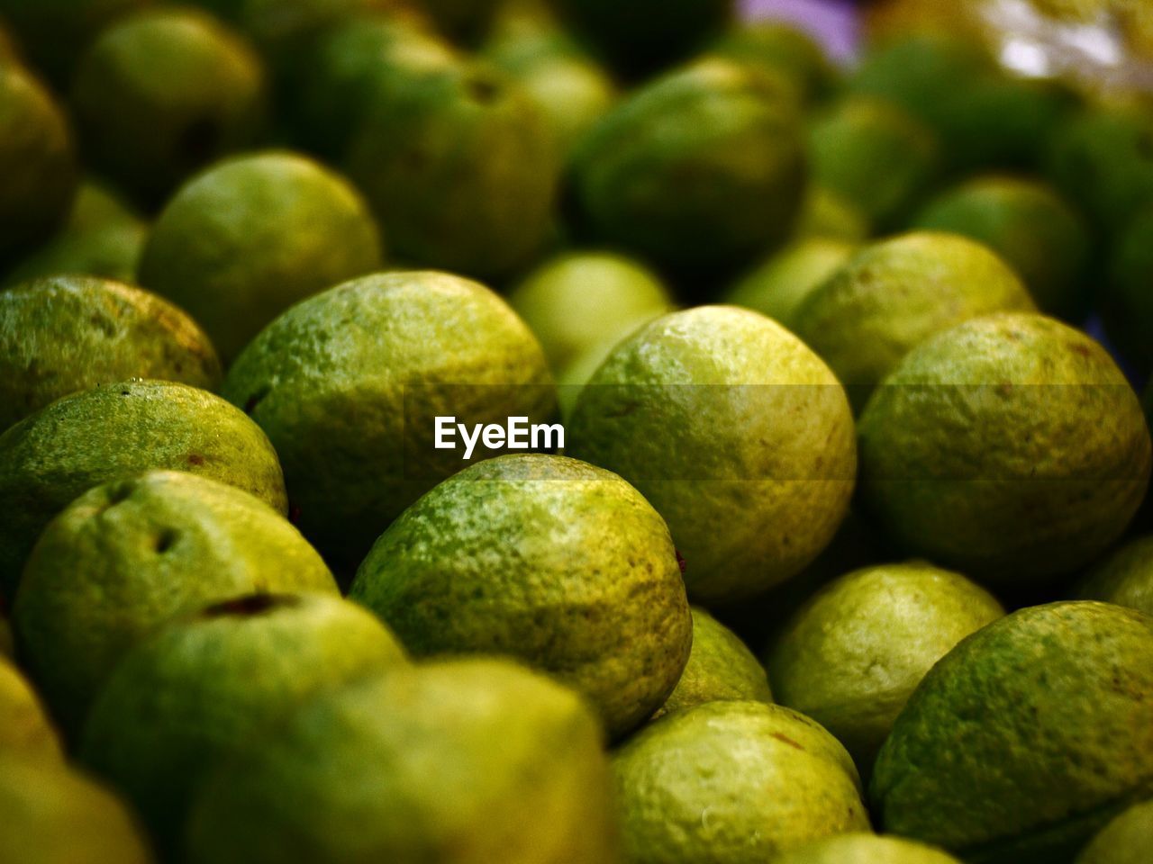 Full frame shot of guavas at market