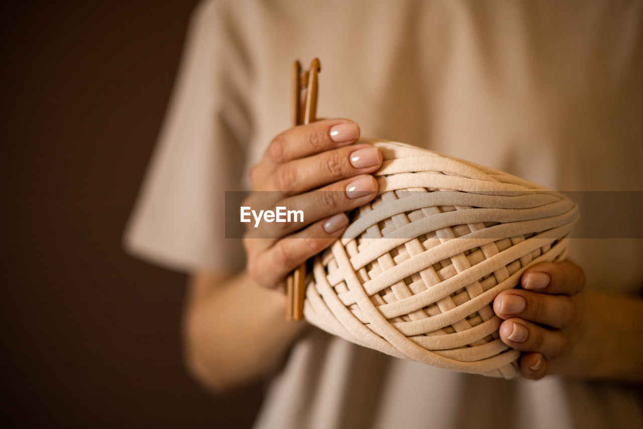 hand, one person, holding, close-up, adult, indoors, midsection, basket, focus on foreground, men