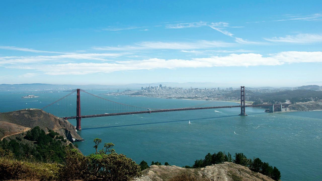 Golden gate bridge over sea against sky