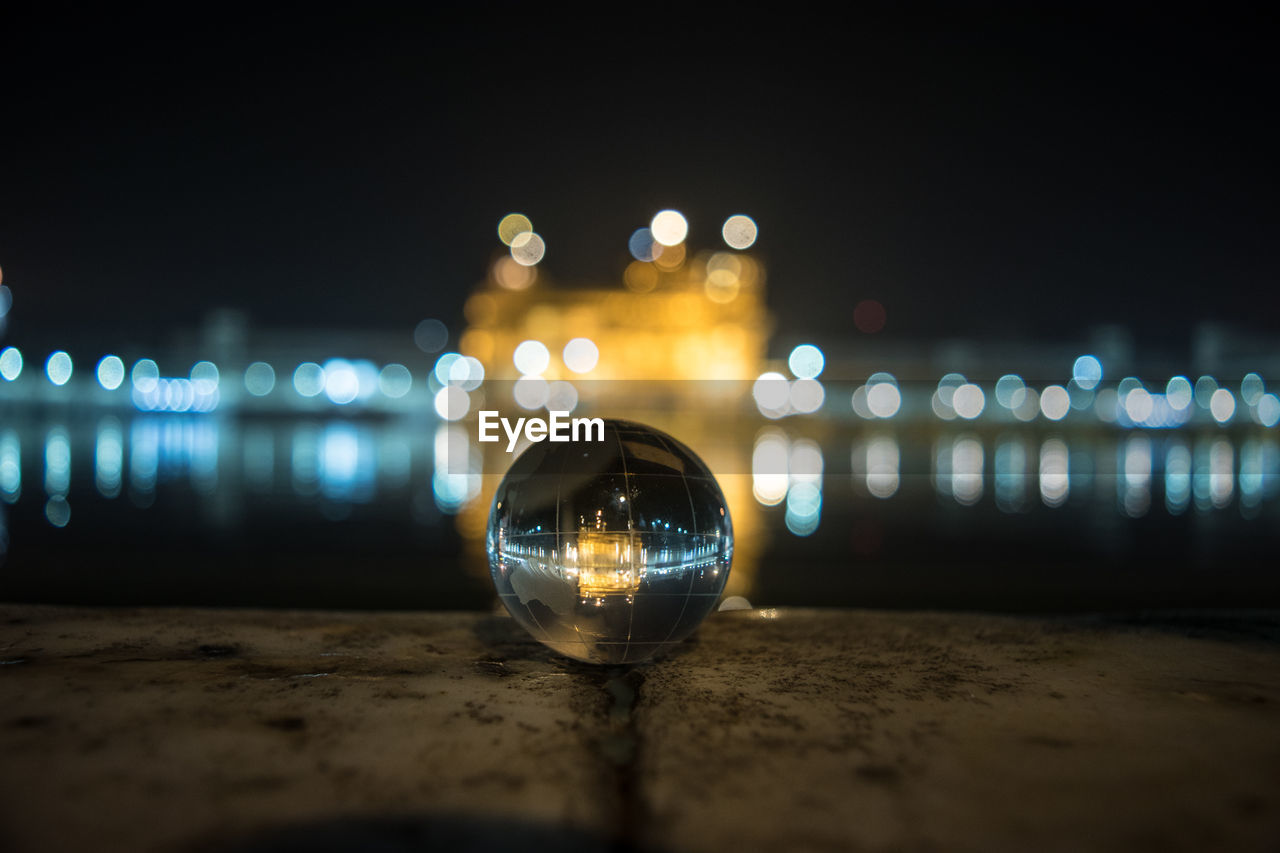 Close-up of illuminated lights at night