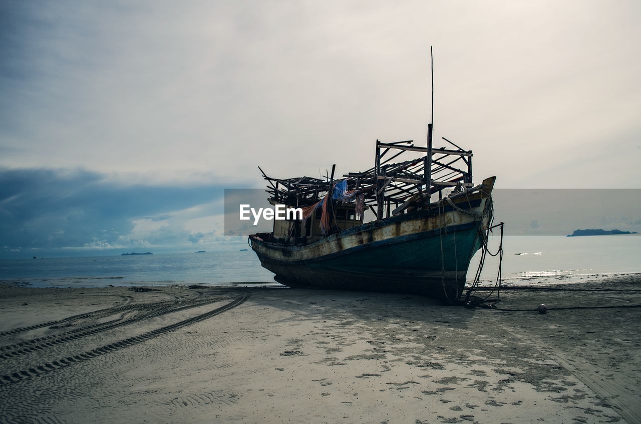 View of shipwreck on beach