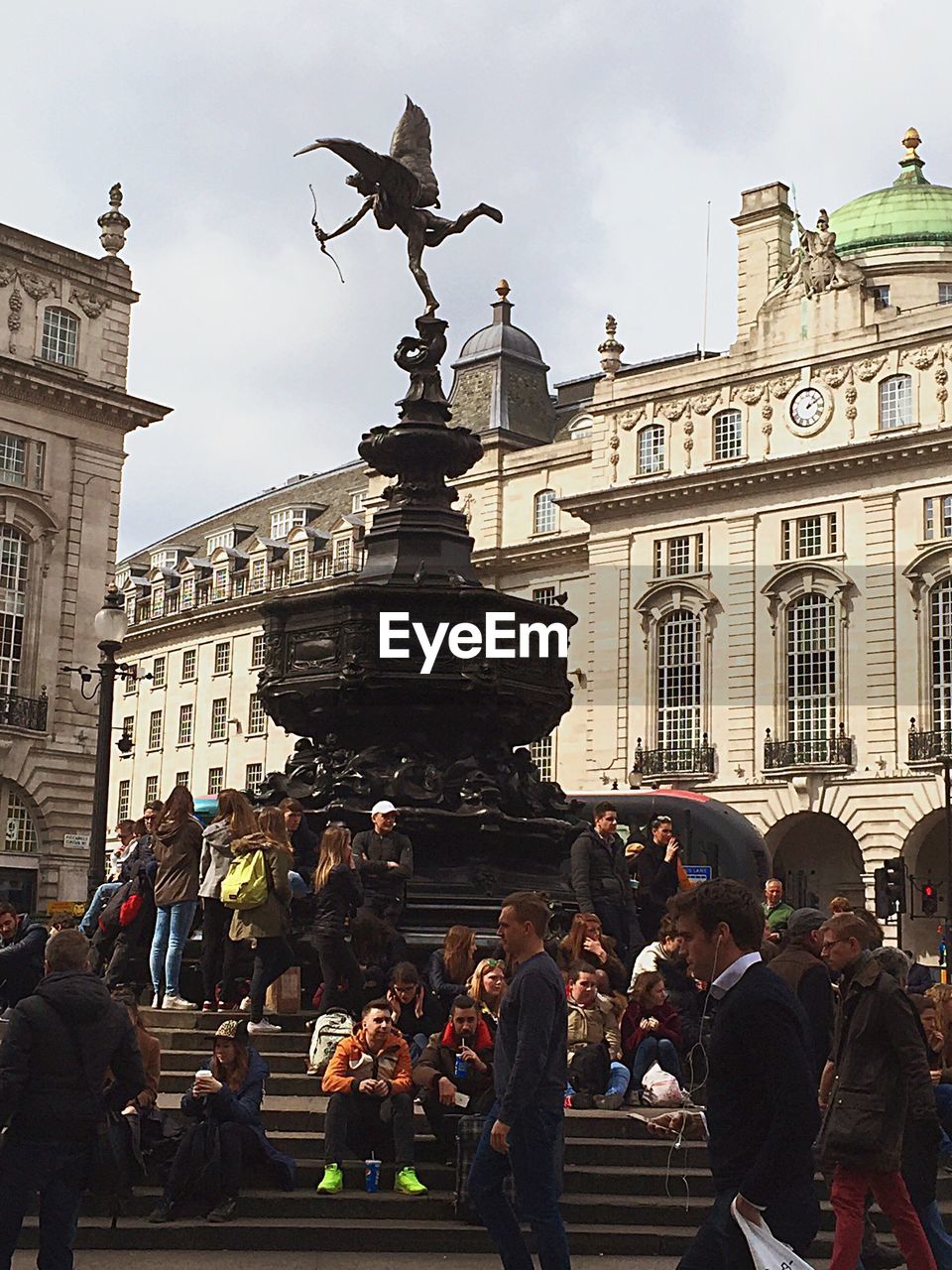 TOURISTS IN FRONT OF BUILDINGS