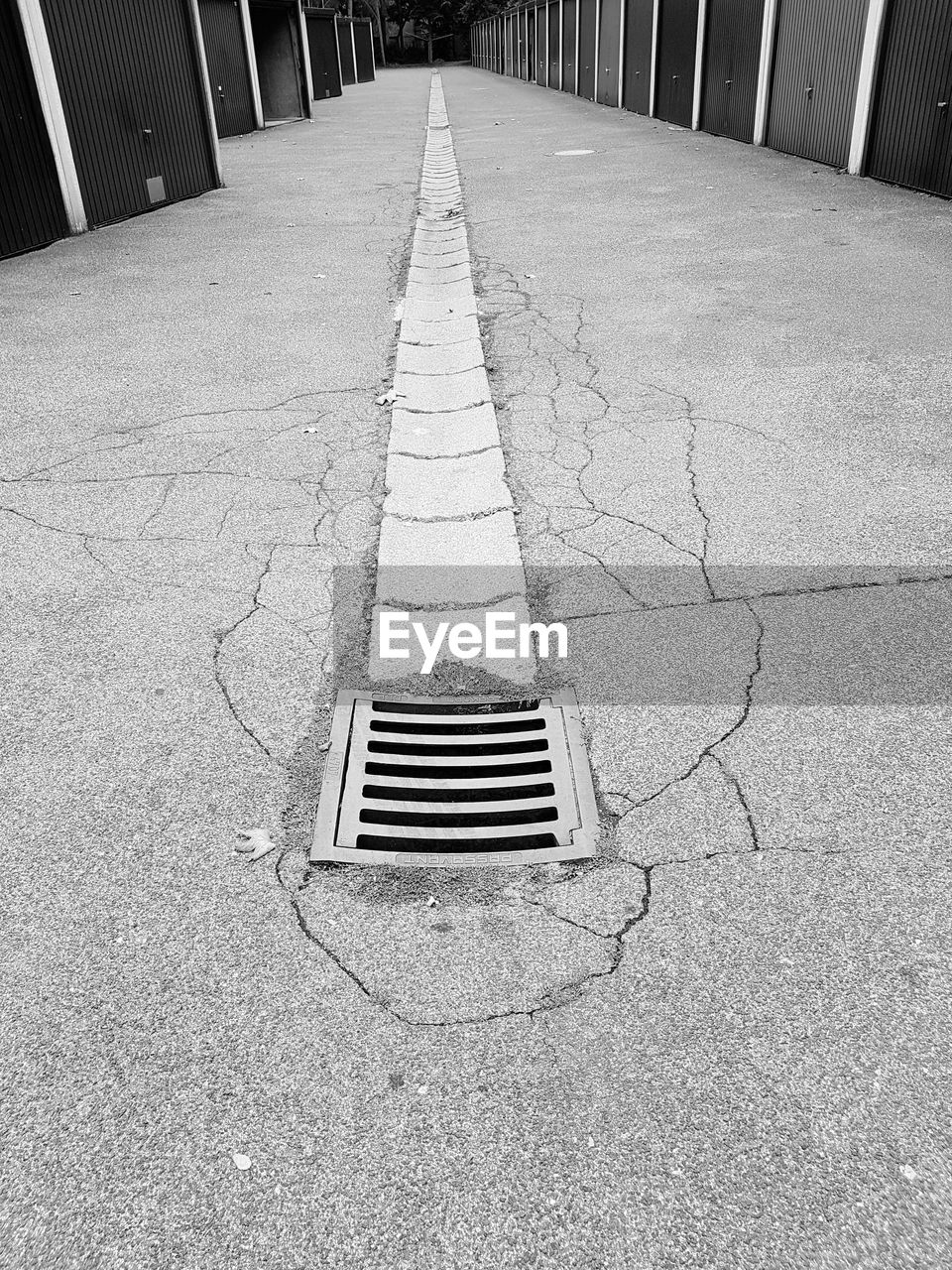 High angle view of manhole on street