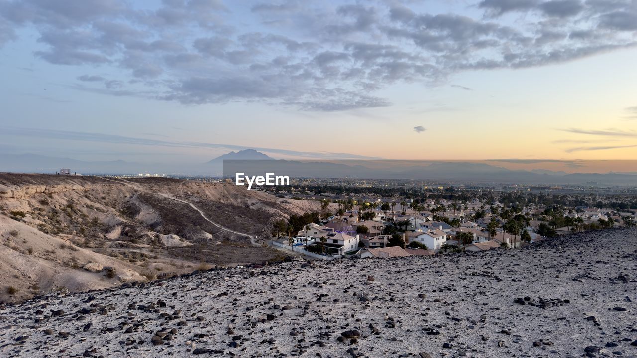 sky, cloud, nature, sea, scenics - nature, landscape, environment, land, beauty in nature, mountain, coast, horizon, rock, shore, no people, sunset, tranquility, sand, natural environment, tranquil scene, outdoors, non-urban scene, architecture, day, travel destinations, snow, water, travel