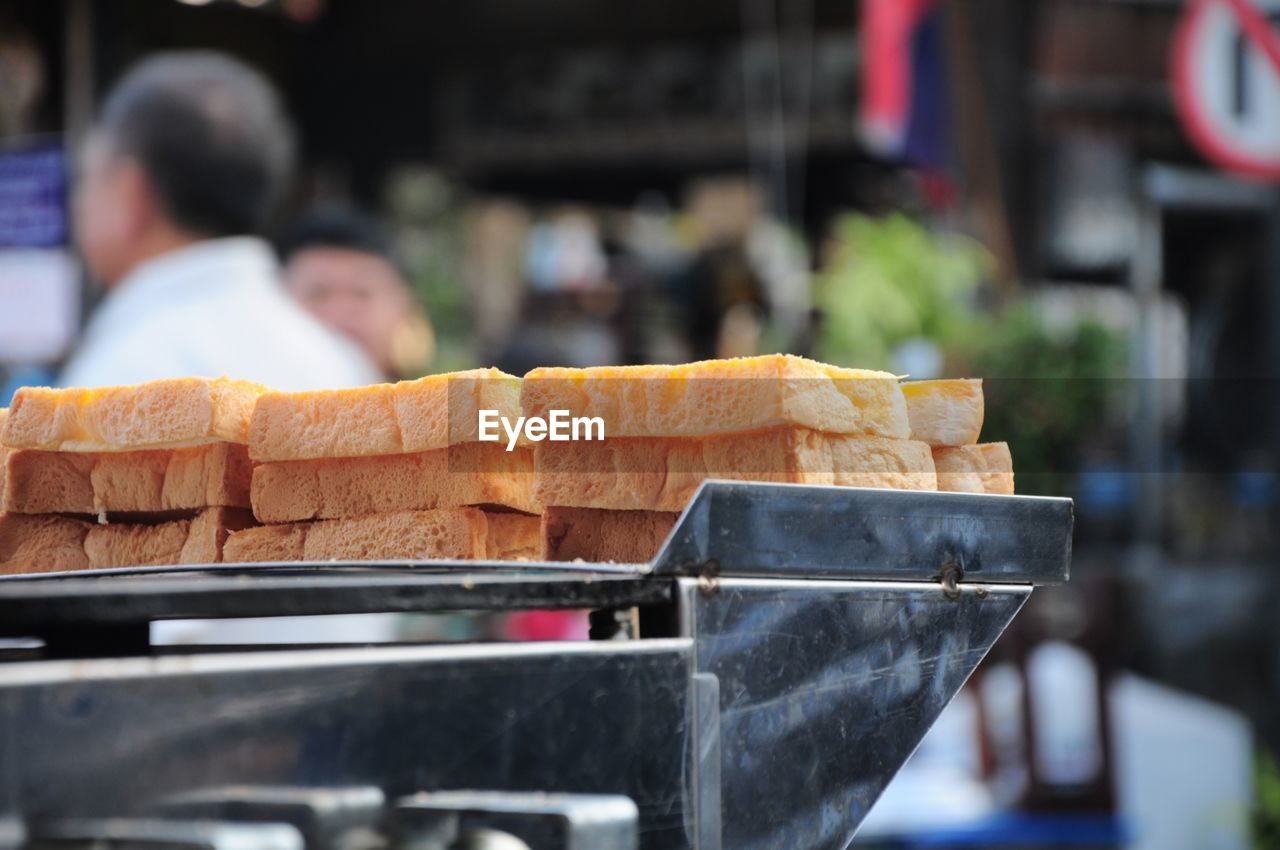 Close-up of bread slices on equipment