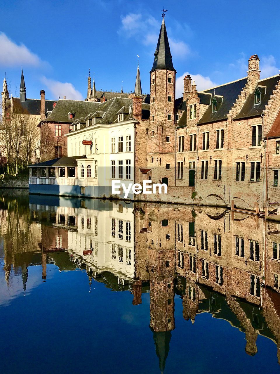 REFLECTION OF BUILDINGS IN WATER
