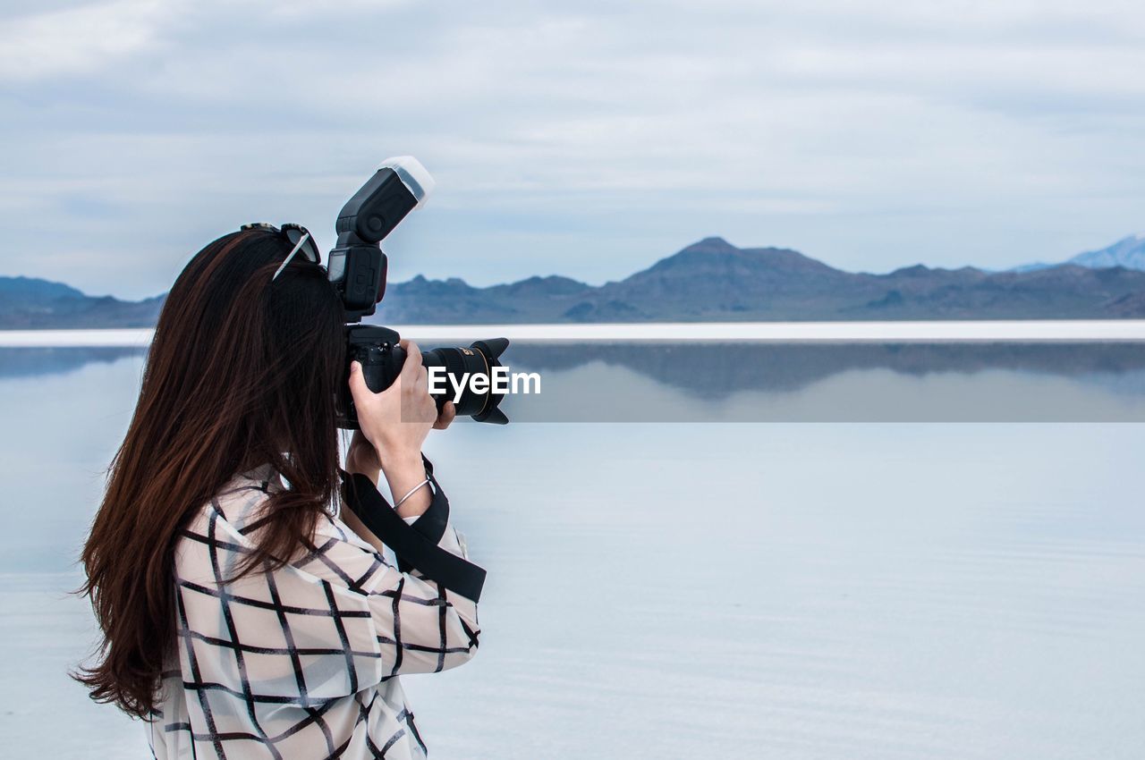 Close-up of woman taking photographs