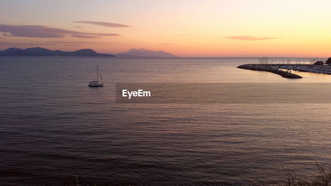 Scenic view of sea against sky during sunset