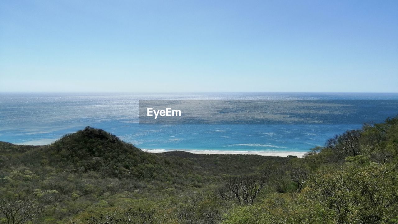 IDYLLIC SHOT OF SEA AGAINST CLEAR SKY