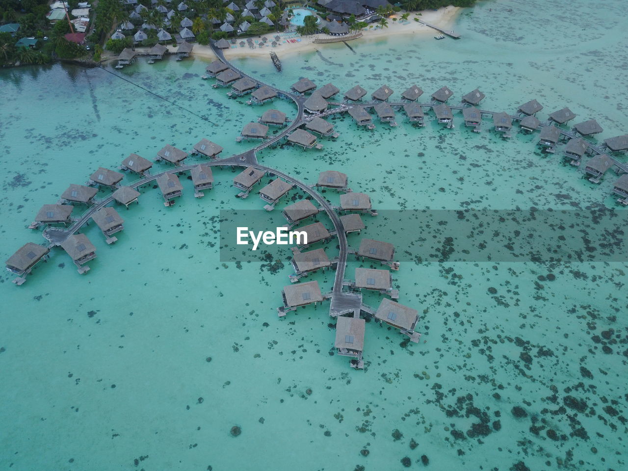 HIGH ANGLE VIEW OF SWIMMING POOL IN BUILDING