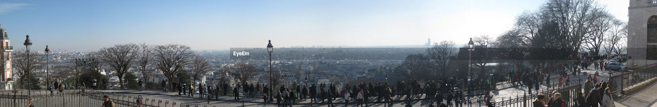 Panoramic view of people at basilique du sacre coeur on sunny day