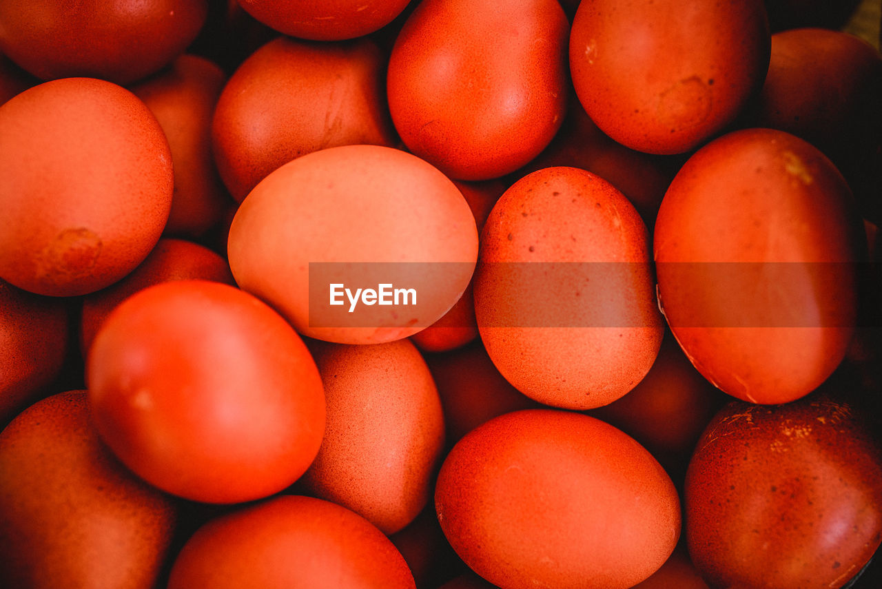 Full frame shot of egg and tomatoes in market