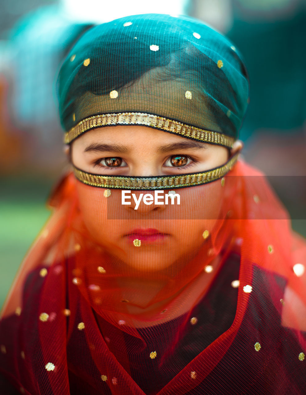 Close-up portrait of girl wearing dupatta