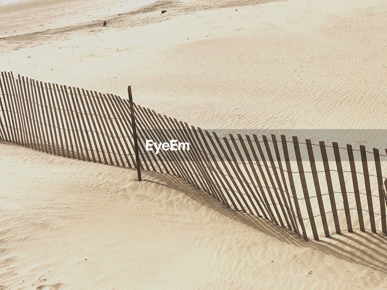 High angle view of fence at beach