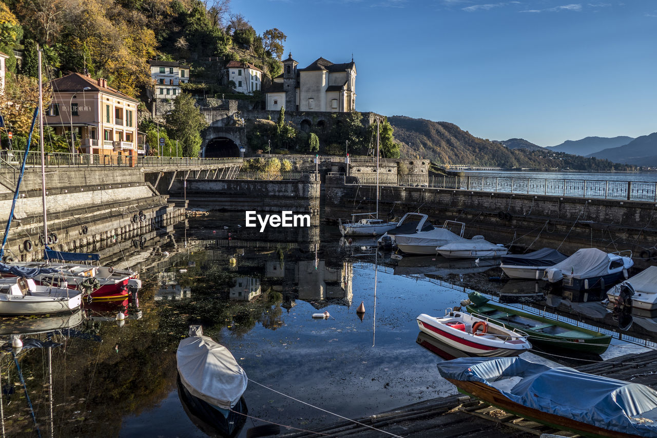 Church that is reflecting in the lake maggiore in maccagno