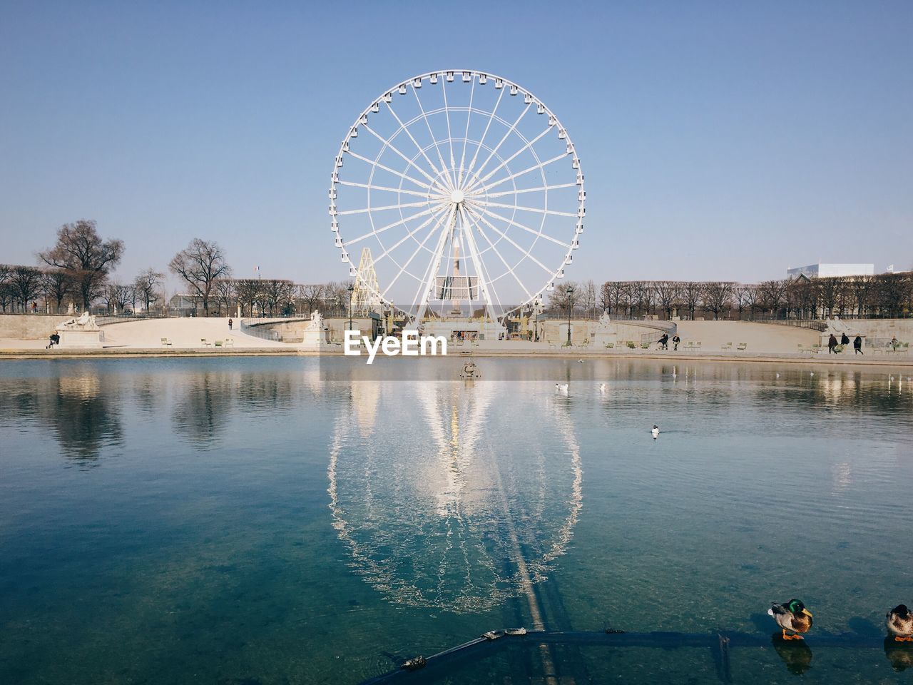 Ferris wheel against blue sky