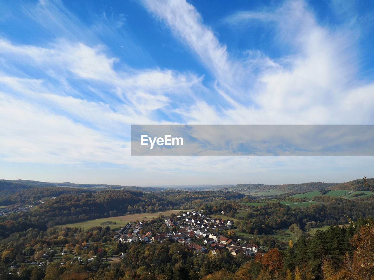 Aerial view of townscape against sky