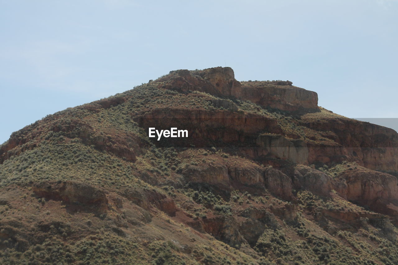 SCENIC VIEW OF MOUNTAIN AGAINST SKY