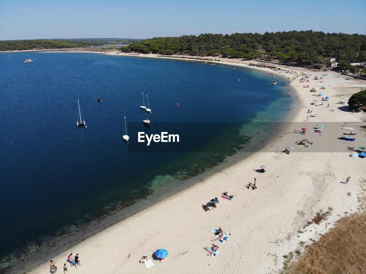 HIGH ANGLE VIEW OF PEOPLE ENJOYING ON BEACH