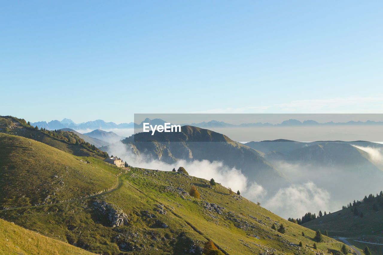 SCENIC VIEW OF MOUNTAIN AGAINST SKY