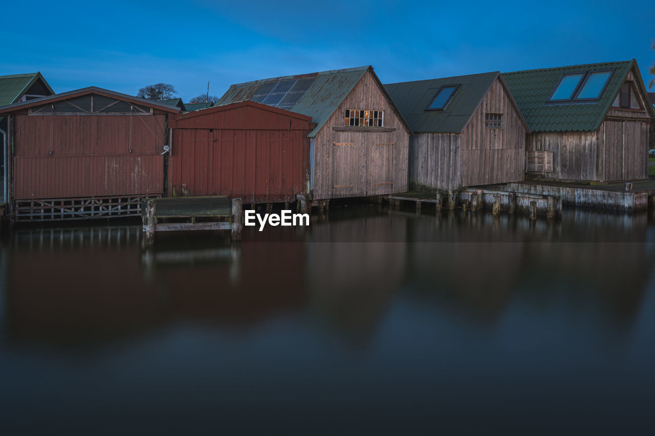 Rustic fisher huts in althagen harbor on darß