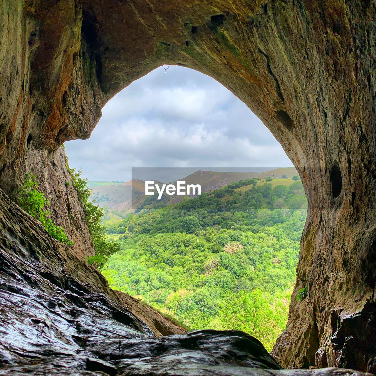 Scenic view from inside of thors cave in the peak district