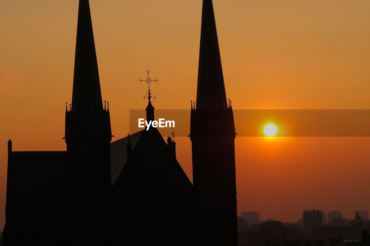 SILHOUETTE OF TEMPLE DURING SUNSET