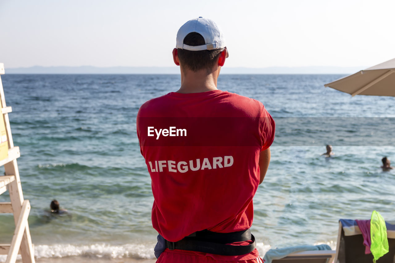 Lifeguard on lagomandra beach to ensure safety on the beach. bathing season in vacation